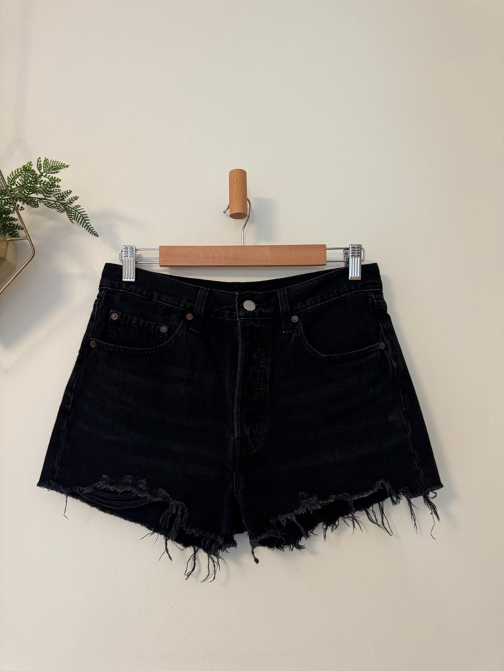 Women's Levi’s size 28 high waisted Black Denim Shorts with button fly